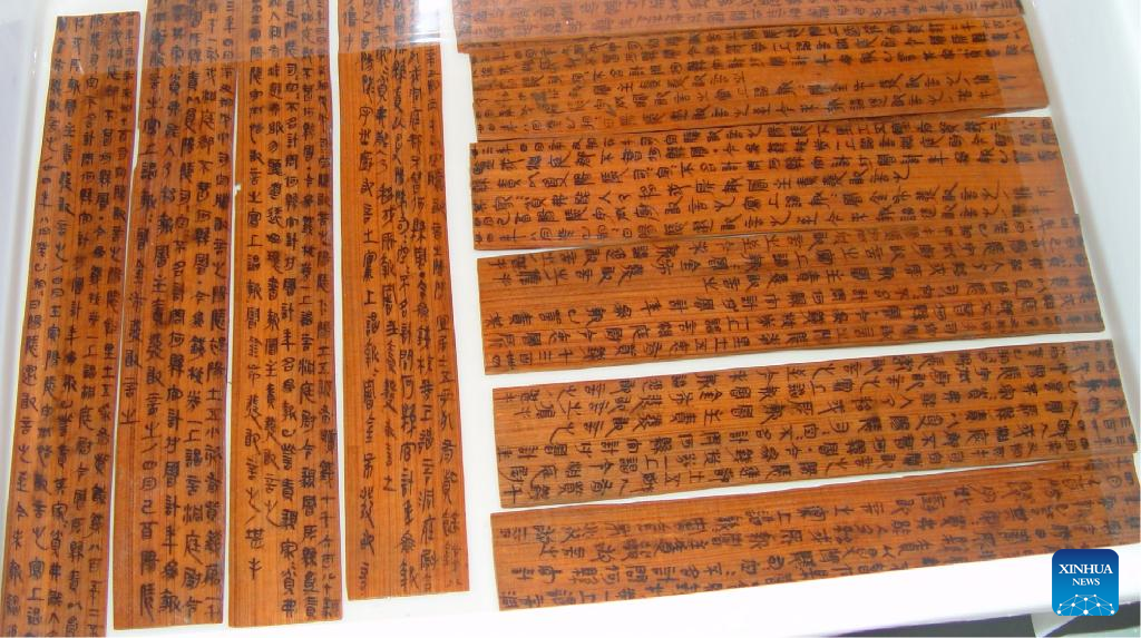 Qin dynasty bamboo slips — the kind of documents Qin Shi Huang reviewed 130 pounds of every single day